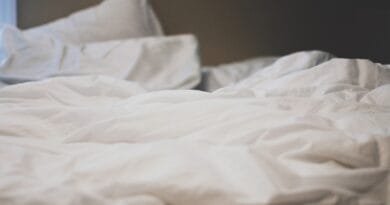bed, sheets, pillows