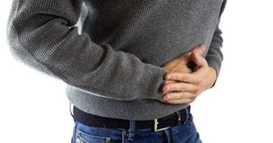 stomach pain, man, jeans