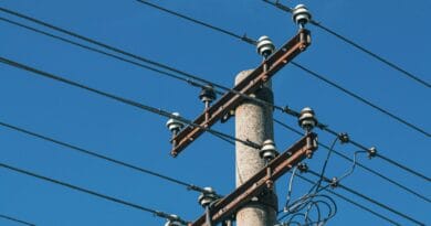a pole with many wires