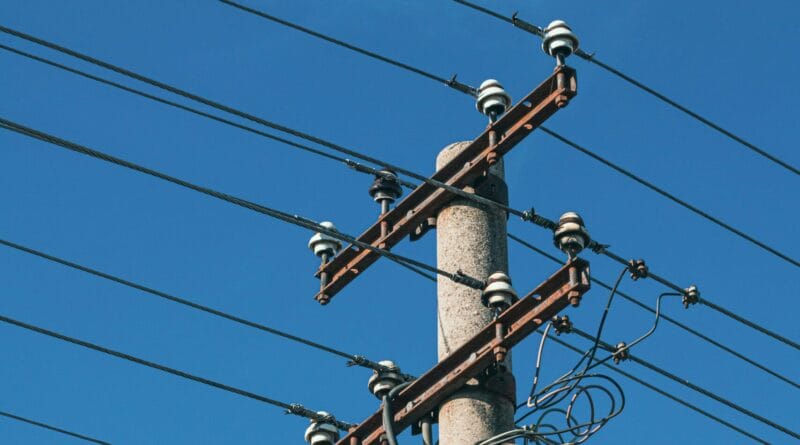 a pole with many wires